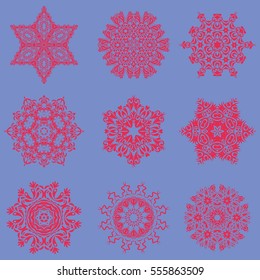 Vector snowflake set on a blue background. Abstract Snow flakes background. Vector Christmas sketch.