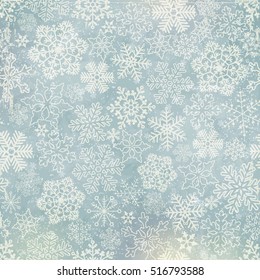 Vector snowflakes blue background with old texture, scratches and colorful spots.