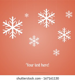 Vector snowflakes made of paper hanging on the red background with a place for text. Origami design. 