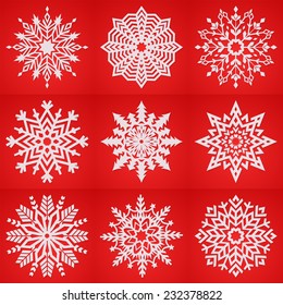 Vector snowflakes on red background