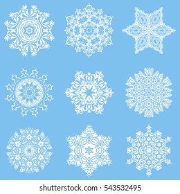 Vector snowflakes set for holiday Thanksgiving day, a simple hand-drawn winter design on a blue background.