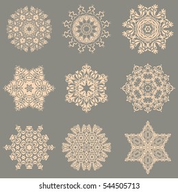 Vector snowflakes set for holiday Thanksgiving day, a simple hand-drawn winter design on a gray background.