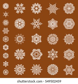 Vector snowflakes with watercolor effect. Textile print for bed linen, jacket, package design, fabric and fashion concepts. Abstract snowflakes set on a brown background.