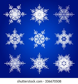 Vector snowflakes white isolated on blue holidays illustration