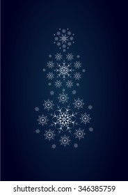 vector snowman consisting of snowflakes on dark blue background