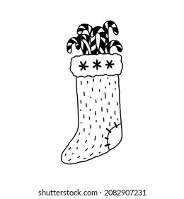 Vector sock isolated on white. Hand drawn doodle Christmas stocking with candy canes.