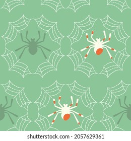 Vector Spiders on Web with Green seamless pattern background. Perfect for fabric, scrapbooking and wallpaper projects.