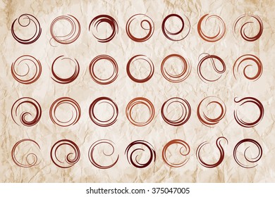 Vector spirals design elements set on a vintage paper background