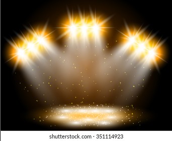 vector spotlight light effect on black background. Concert scene with sparks illuminated by golden glow ray. Star flash.