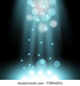 Vector spotlight. Light effect with sparks, particles of light on black background, aqua color