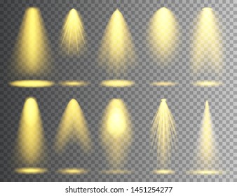 Vector spotlight set. Bright Christmas glowing light beam. Transparent realistic effect. Stage lighting.