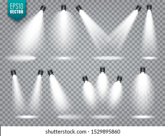 Vector spotlight set. Bright light beam. Transparent realistic effect. Stage lighting. Illuminated studio spotlights.