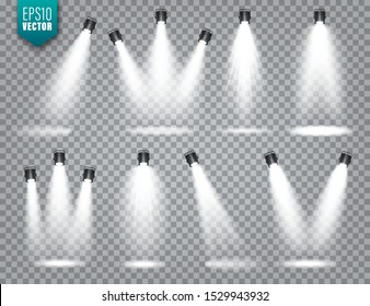 Vector spotlight set. Bright light beam. Transparent realistic effect. Stage lighting. Illuminated studio spotlights.