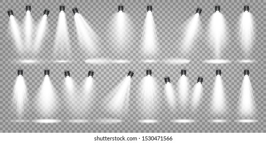 Vector spotlight set. Bright light beam. Transparent realistic effect. Stage lighting. Illuminated studio spotlights.