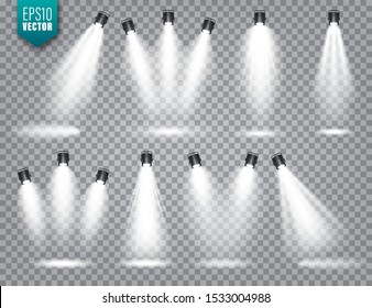 Vector spotlight set. Bright light beam. Transparent realistic effect. Stage lighting. Illuminated studio spotlights.