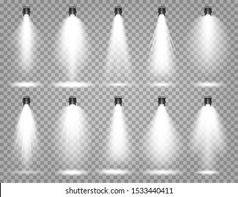 Vector spotlight set. Bright light beam. Transparent realistic effect. Stage lighting. Illuminated studio spotlights.