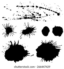 Vector spots of black paint, ink splashes on white background. Abstract paint stains