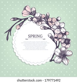 Vector spring design for your card or invitation with hand drawn blooming fruit tree twig illustration on mint background