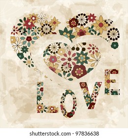 vector spring  flowers organized in heart shape and word "love", old paper texture