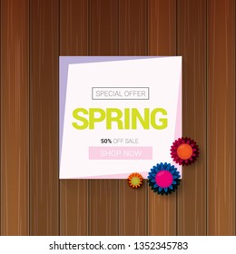 vector spring sale design template banner or tag on wooden background with sun lights. Abstract spring sale pink label or background with beautiful flowers and text.