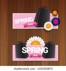 vector spring sale design template banner or tag on wooden background with sun lights. Abstract spring sale pink label or background with beautiful flowers and text.