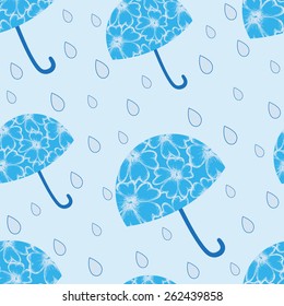 vector spring seamless pattern with the image of floral umbrellas and rain drops