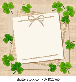 Vector St. Patrick's day card with shamrock on a beige sacking background.
