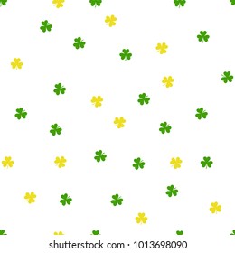 Vector St. Patrick's day seamless pattern with green and yellow shamrock leaves on a white background.EPS10