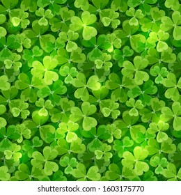 Vector St. Patrick's day seamless background texture with green shamrock leaves.