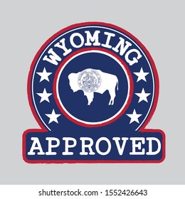 Vector Stamp of Approved logo with Wyoming Flag in the round shape on the center. The states of America. Grunge Rubber Texture Stamp of Approved from Wyoming.