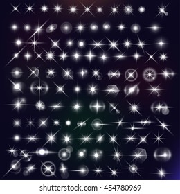 Vector stars mega set. White flares effect on dark background. Release clipping mask for work.