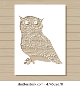 Vector stencil template of owl on wooden background