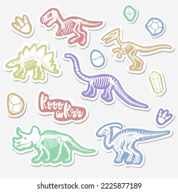 Vector sticker set with dinosaur skeleton isolated on a white background.