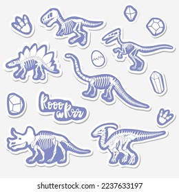 Vector sticker set with dinosaur skeleton isolated on a white background.