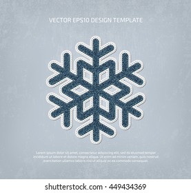 Vector stitched denim applique style snowflake icon. 