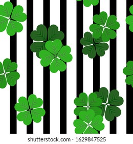 vector stripes seamless black and white pattern with green shamrocks