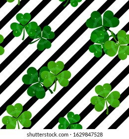 vector stripes seamless black and white pattern with green shamrocks