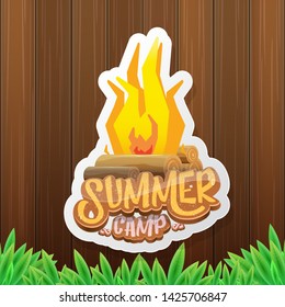 vector summer kids camp cartoon logo with campfire isolated on wooden background. Summer camp vintage funky flyer, funny label or poster design template with fireplace and calligraphic text 
