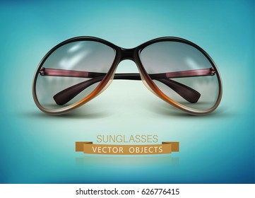 Vector sunglasses isolated on a blue background