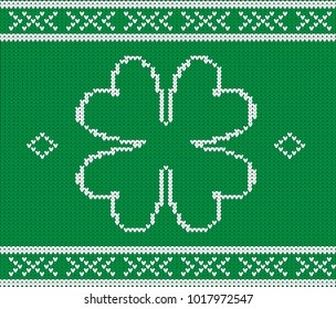 Vector sweater pattern for St. Patrick's Day with green colour background and four-leaved clover

