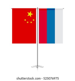 vector table stand with flags of china and russia. symbolizing the cooperation between the two countries. vector table flags