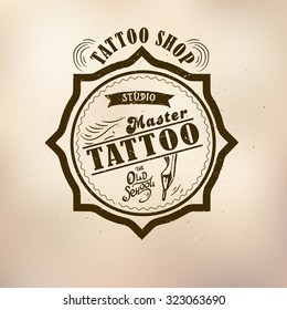 Vector tattoo studio logo templates on dark background. Cool retro styled vector emblems.