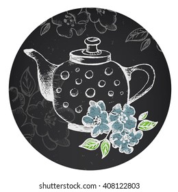Vector teapot with flower of jasmine. Set of hand drawn vector illustration on a gray board. Freehand drawing with imitation of chalk sketch
