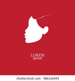 Vector template abstract logo for woman salons and shops. white female profile on a purple background