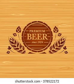 Vector template beer emblem on a wooden background