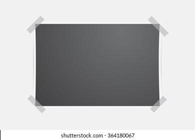 Vector template. Black sheet of paper glued with adhesive tape to the wall.