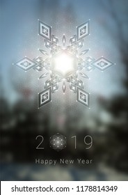 Vector template of greeting card or poster; Happy New Year 2019; Diamond snowflake in sacred geometry style on winter blurred background; Spirituality and zen meditation.