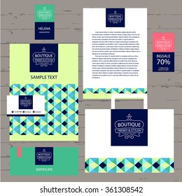 Vector template logo and corporate identity for the boutique. A set of stationery items with geometric mosaic pattern of triangles.