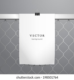 Vector template. The paper hangs on the chain-link fence. White sheet of paper held by clamps.