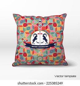 Vector template. Pillow with abstract geometric background in retro style. Multicolored figures and grid. Beautiful round label with two goats and ribbon. Realistic shadows.